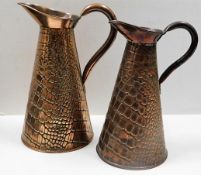 Two decorative copper water jugs, 11in & 10in tall