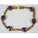 A 9ct gold amethyst bracelet 13.1g