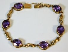 A 9ct gold amethyst bracelet 13.1g