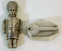 An antique silver soldier rattle a/f twinned with