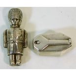 An antique silver soldier rattle a/f twinned with