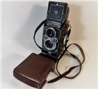 A Rolleiflex DBP 3.5F DBGM Franke & Heidecke syncr