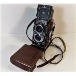 A Rolleiflex DBP 3.5F DBGM Franke & Heidecke syncr