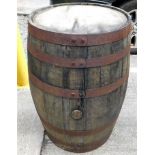 A coopered oak bourbon whisky barrel, 35in high x