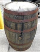 A coopered oak bourbon whisky barrel, 35in high x