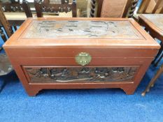 An Oriental carved camphor wood chest 36.5in wide