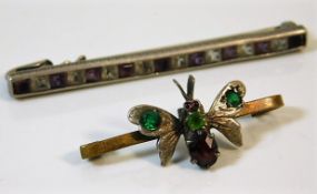 An antique butterfly brooch twinned with a silver