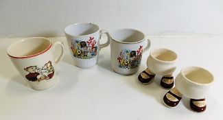 Three pieces of nursery ware twinned with a pair o