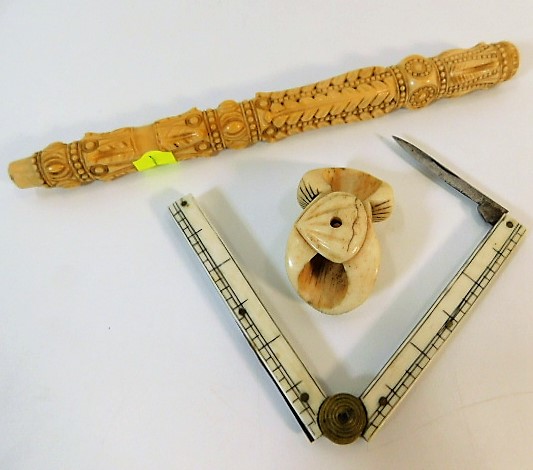 A carved ivory fungi netsuke twinned with an ivory