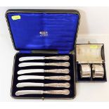 A set of six silver handled fruit knives twinned w