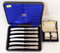 A set of six silver handled fruit knives twinned w
