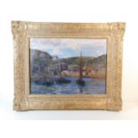 An oil on canvas depicting Polperro harbour & vill