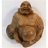 An antique carved wooden Buddha 8in