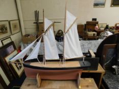 A model of a yacht 32.5in long x 31in high