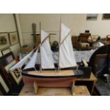 A model of a yacht 32.5in long x 31in high