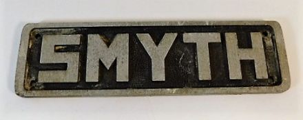 A solid cast alloy name plaque SMYTH 8.25in wide x