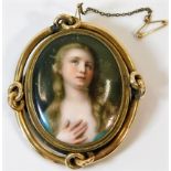 A 19thC. yellow metal framed mourning brooch set w