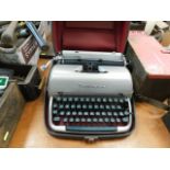 A vintage cased Remington typewriter
