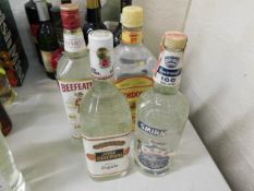 Four bottles of unopened alcohol including two bot