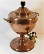 A c.1900 copper samovar with brass tap 13.75in hig