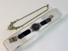 A vintage Swatch watch twinned with a 1950's piece