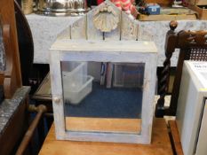 A small shabby chic style vintage mirrored vanity