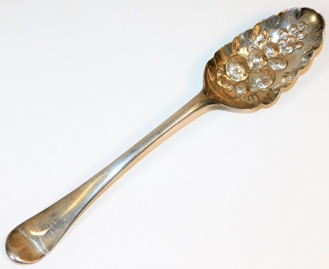 A George II silver berry spoon, indistinct marks d