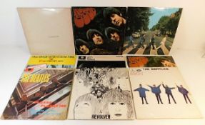 A quantity of 9 Beatles vinyl LP's including Mono