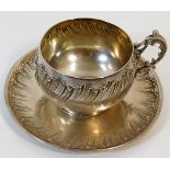 A decorative French silver cup & saucer 200g