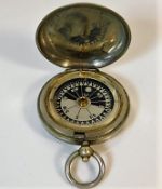 A WW1 military compass in case marked Dennison, Bi