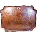 A large art nouveau copper tray with inscribed dec