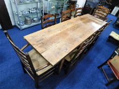 An impressive 18thC. elm farmhouse refectory table, 8ft 2in long x 30in wide set with six rush seate