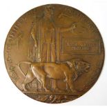 A WW1 bronze death plaque awarded to John William
