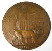 A WW1 bronze death plaque awarded to John William