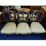 A set of six 19thC. upholstered walnut dining chai
