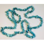 A polished turquoise chip necklace 84.2g 34in long