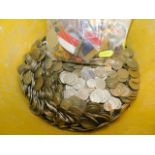 A bucket of Cypriot coinage, other coinage & a bag