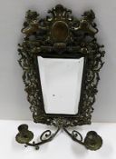 A late 19thC. brass mounted mirrored wall sconce w