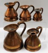 A set of five graduated antique copper haystack ju