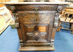 A 19thC. continental oak cupboard with drawer over