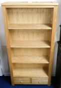 A modern solid oak bookcase 72in high x 36in wide