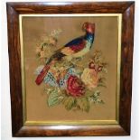 An early 19thC. raised work picture of parrot & fl