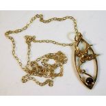 A 9ct gold 16in chain with bird pendant decorated