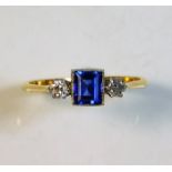 An antique 18ct gold sapphire ring set with a diam