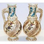 A pair of c.1900 Hungarian reticulated ewers by Fi