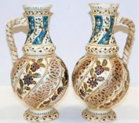 A pair of c.1900 Hungarian reticulated ewers by Fi