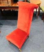 A mid 19thC. upholstered prie-dieu chair. Provenan