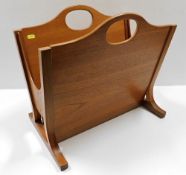 A Parker Knoll retro teak magazine rack