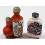 Two Chinese porcelain snuff bottles with jade tops