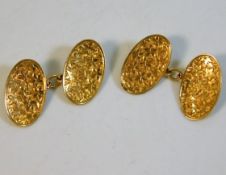 A pair of 18ct gold cufflinks with maple/ivy leaf